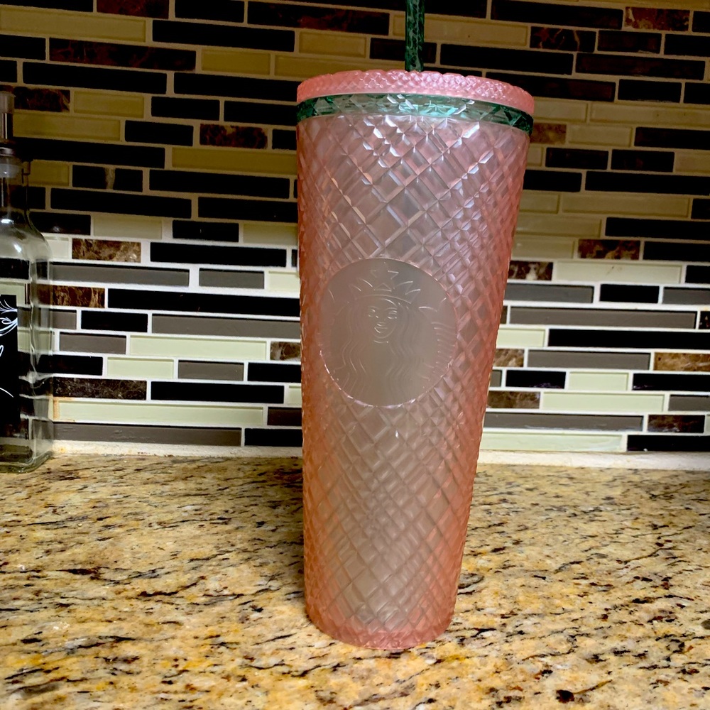 Pink and green 24oz Starbucks cup